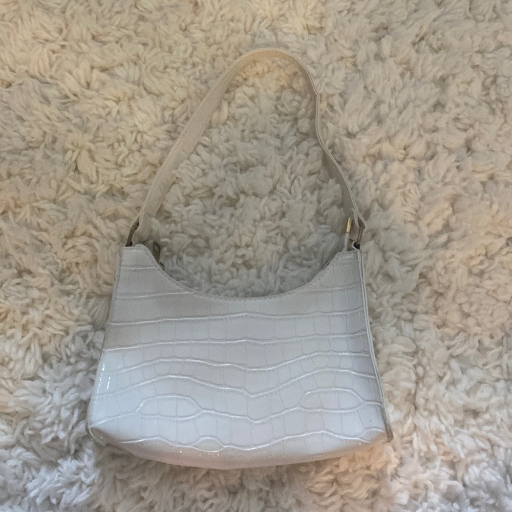 Glossy snake skin white and gold hand bag